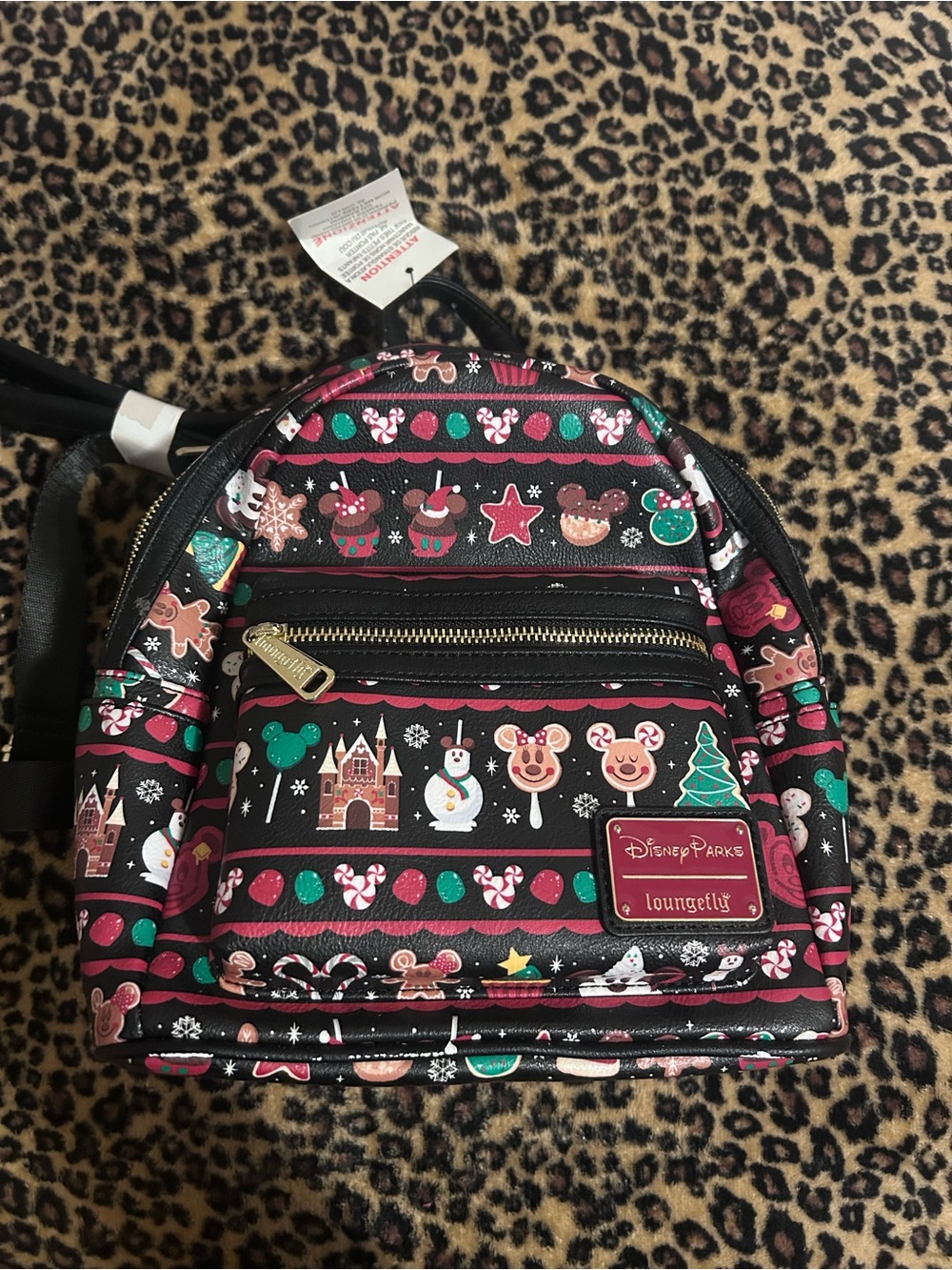 Loungefly Black Mini Backpack with Pink & Green Holiday Icons